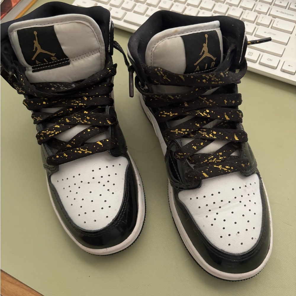 Kids Black and White Sneakers with Gold Accents